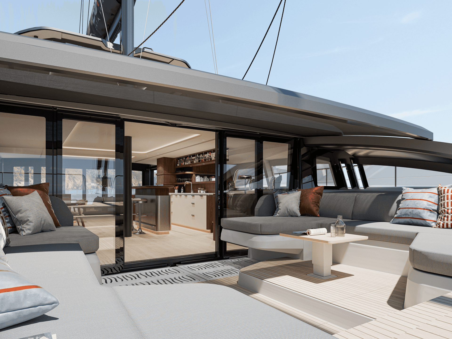 Opening onto the foredeck of the Bali 7.0 catamaran with lounge area and ocean view